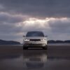 front view of white hyundai car on wet road