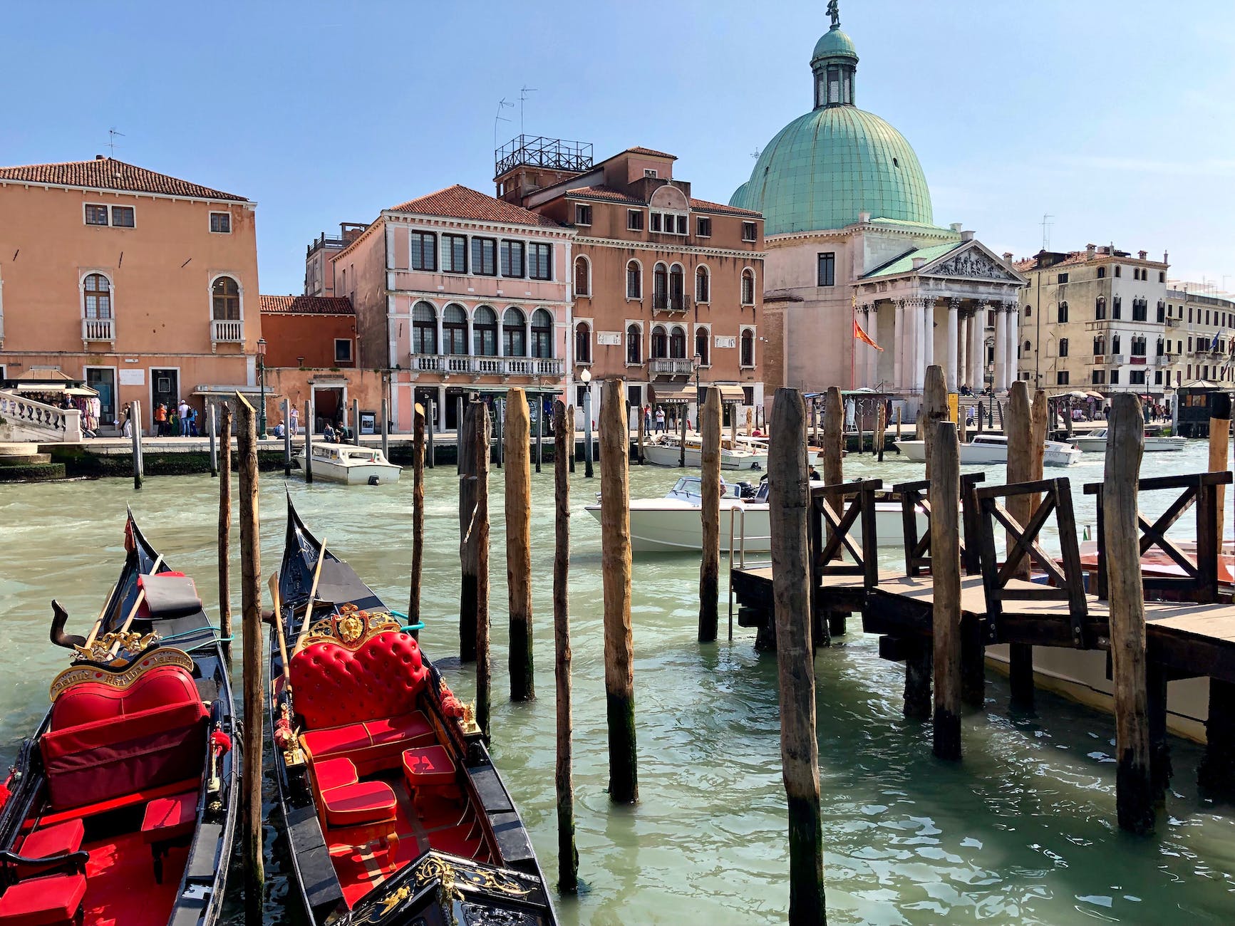 gondolas and boats in venice grand canal