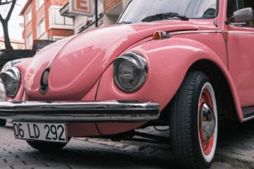 photograph of a pink car