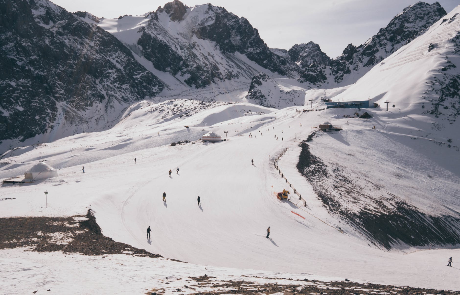 people skiing at a snow covered mountain